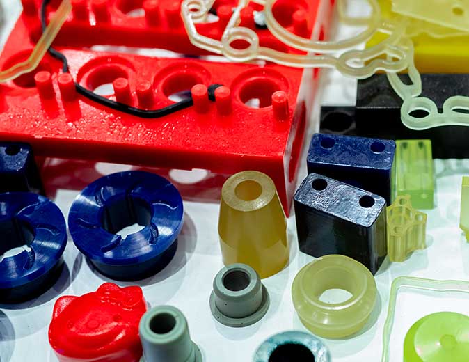 a collection of injection molded plastic parts